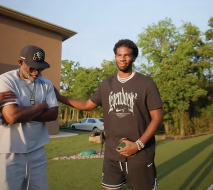 The Sanders family discussing Shedeur's slide.